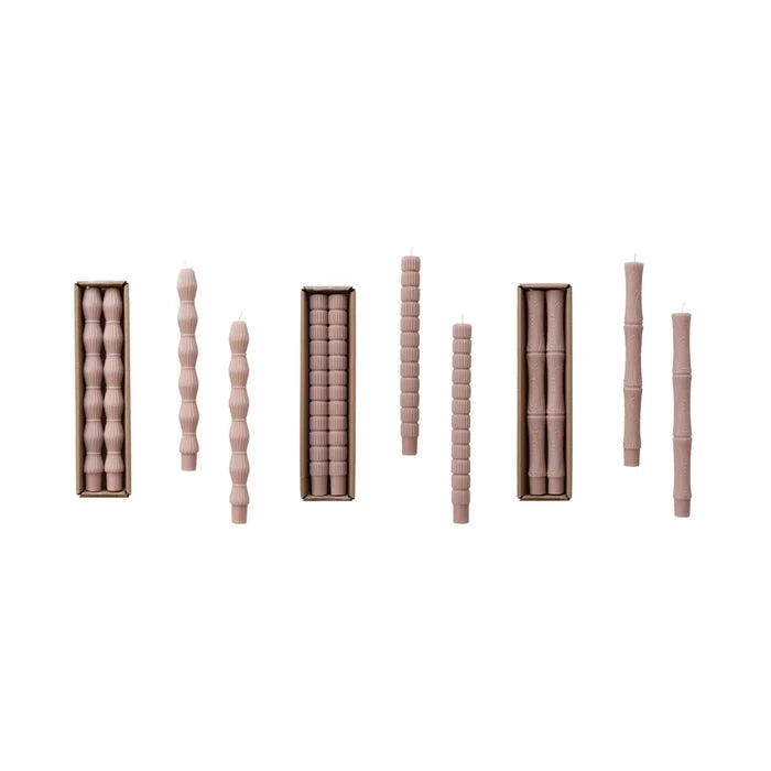 Set of two taper candles in a khaki color, in three different styles.