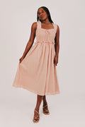 sunset colored midi dress with shirred bodice