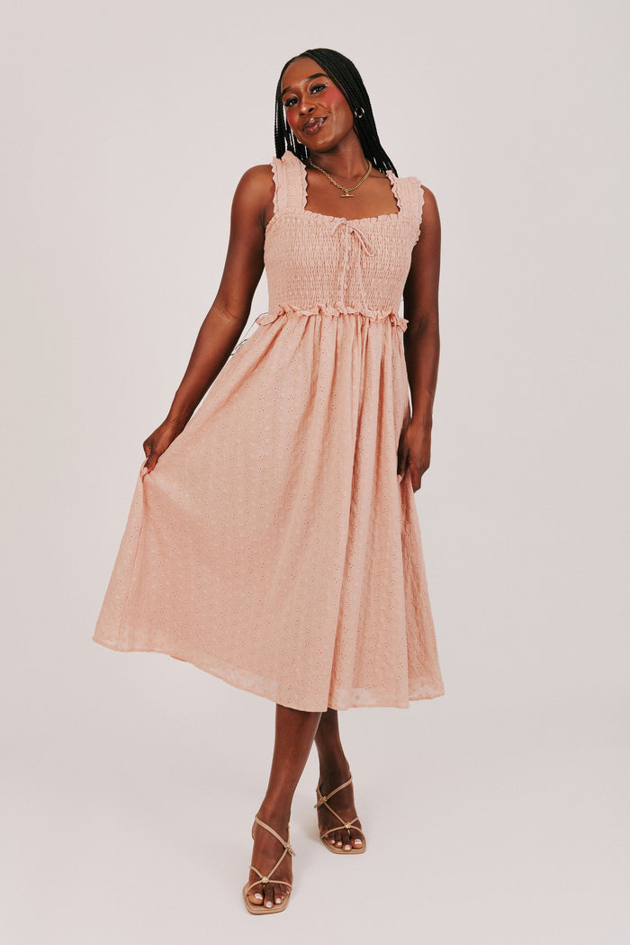 sunset colored midi dress with shirred bodice