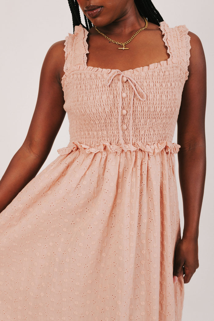 sunset colored midi dress with shirred bodice