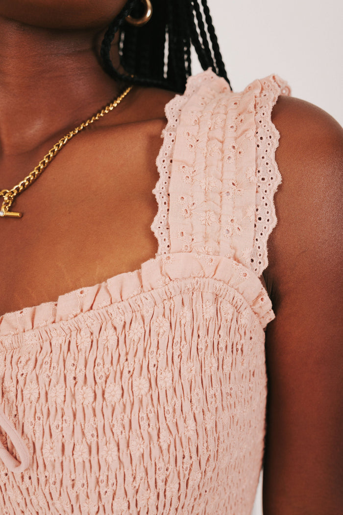 sunset colored midi dress with shirred bodice