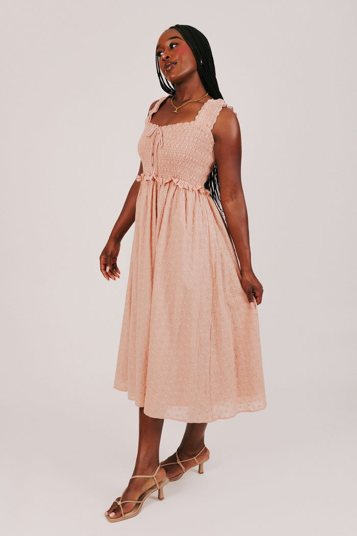 sunset colored midi dress with shirred bodice side