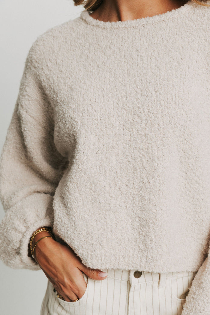 cream sweater with lantern sleeves close