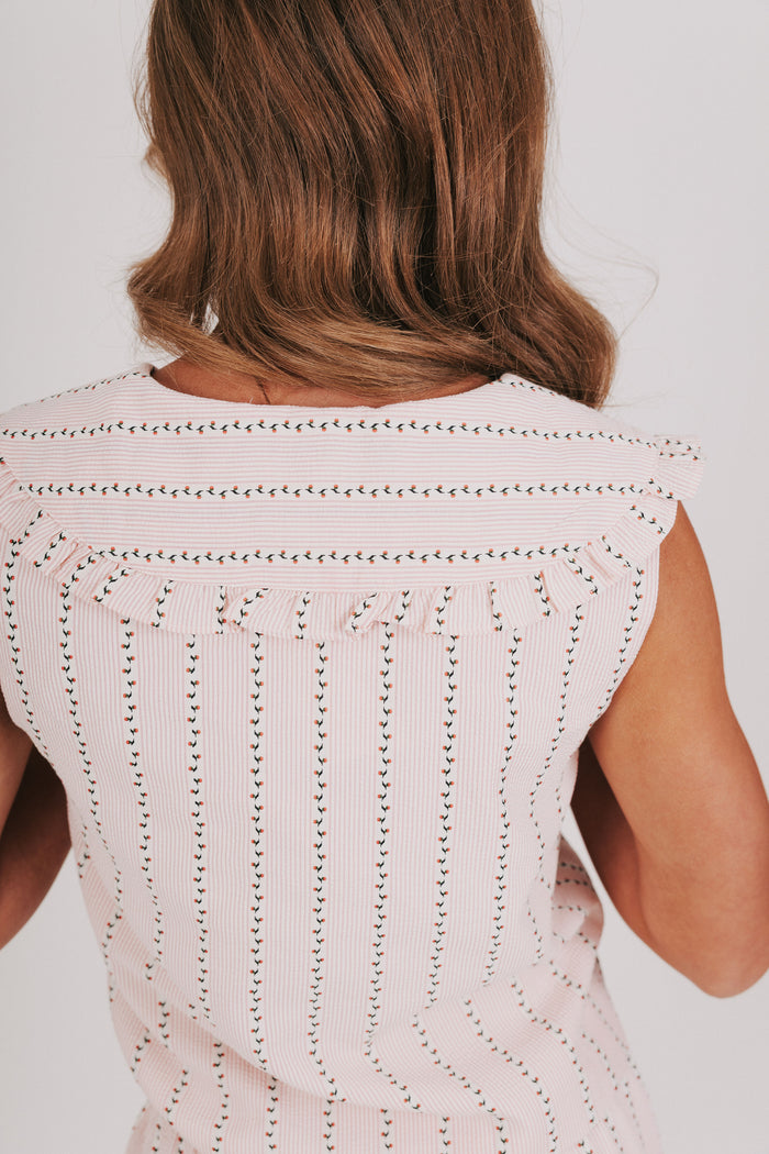 pink and white floral striped top with pan collar back close up