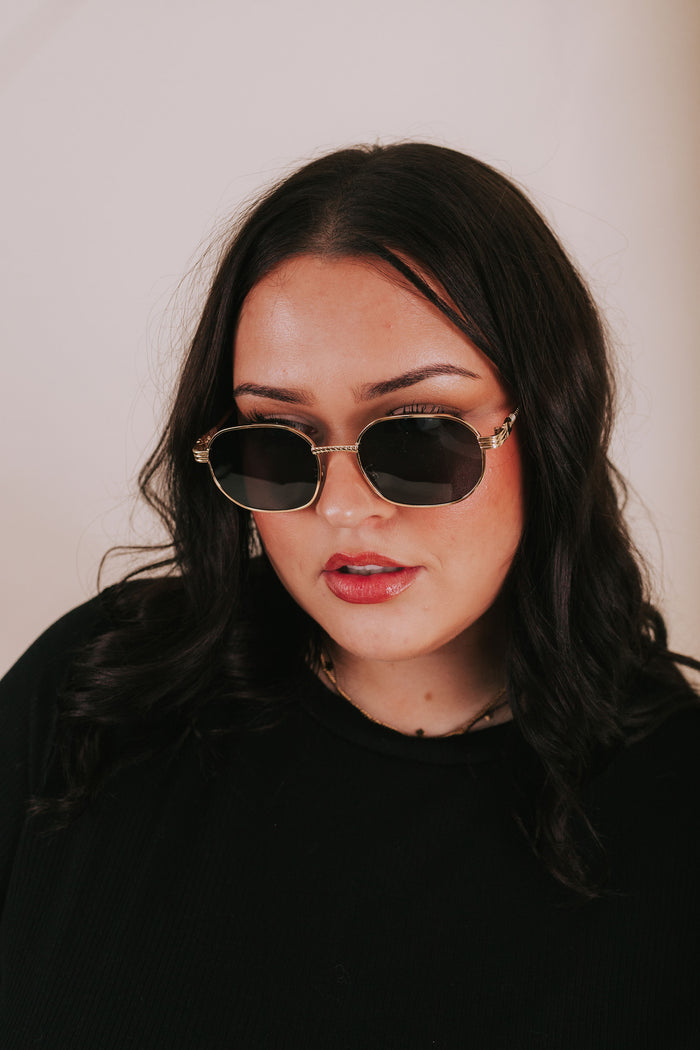 textured sunglasses gold trim black lenses