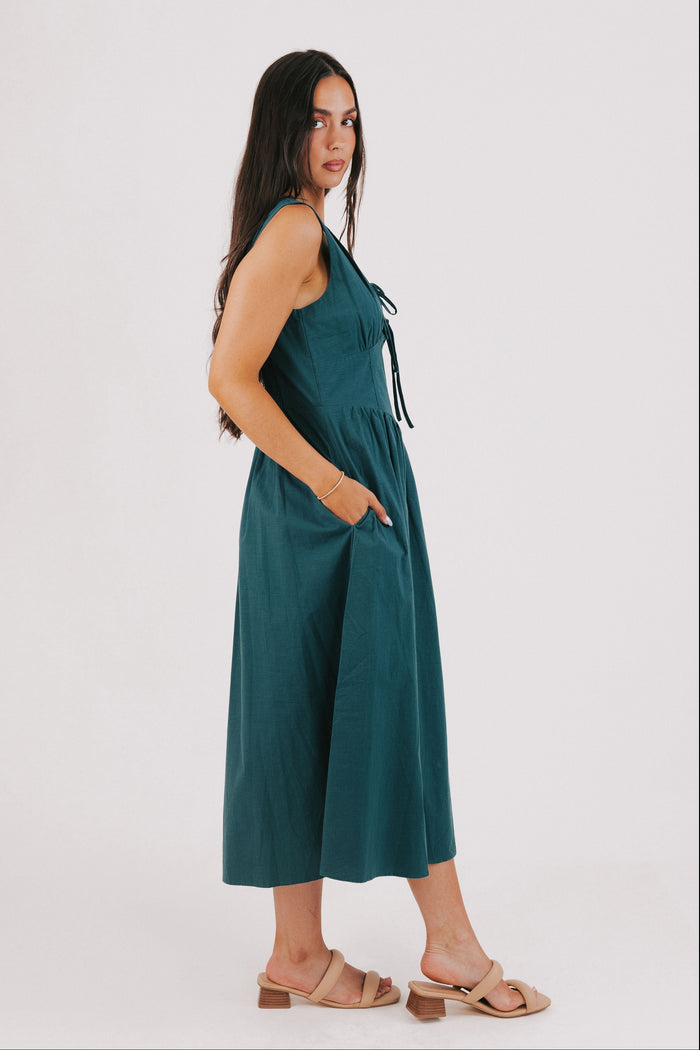 hunter green sleeveless v neck midi dress side