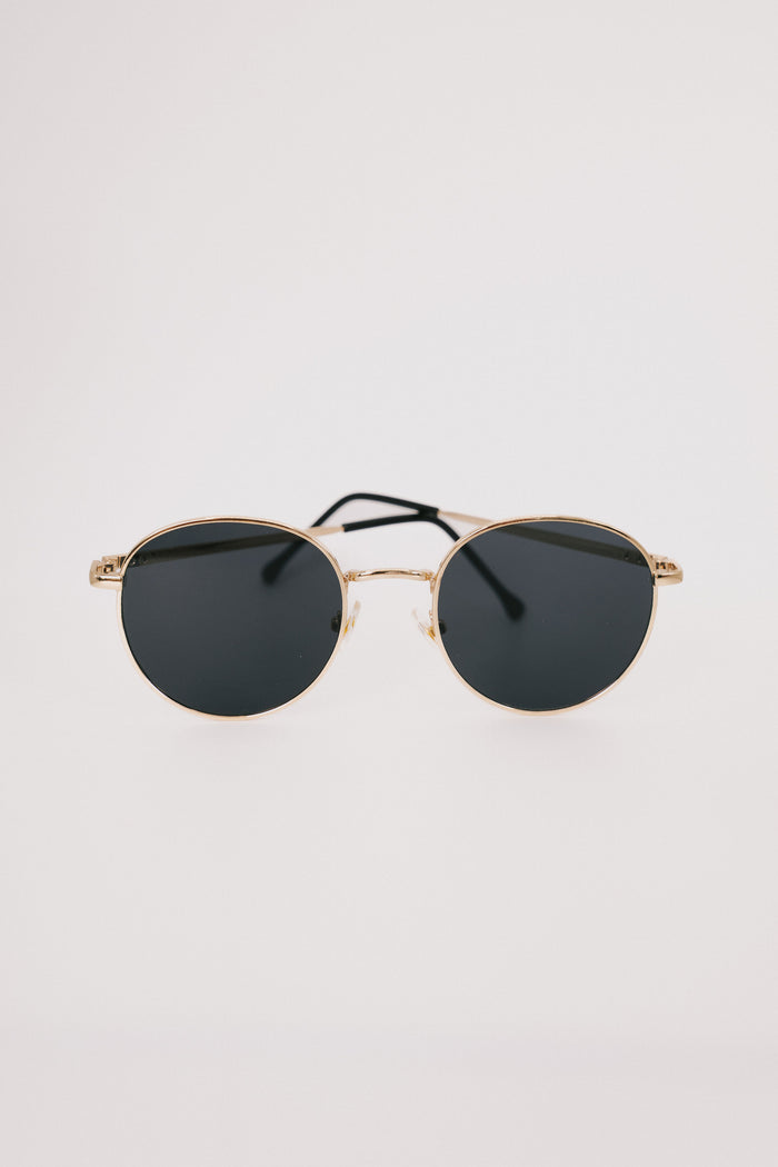 gold framed round sunglasses