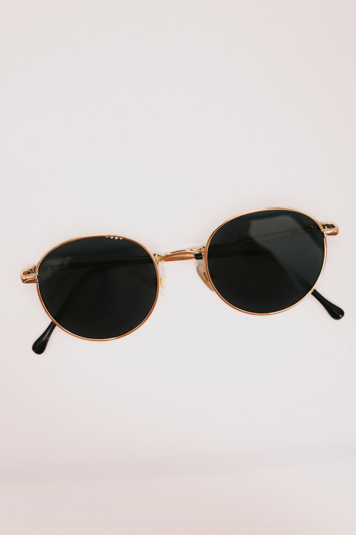 gold framed round sunglasses