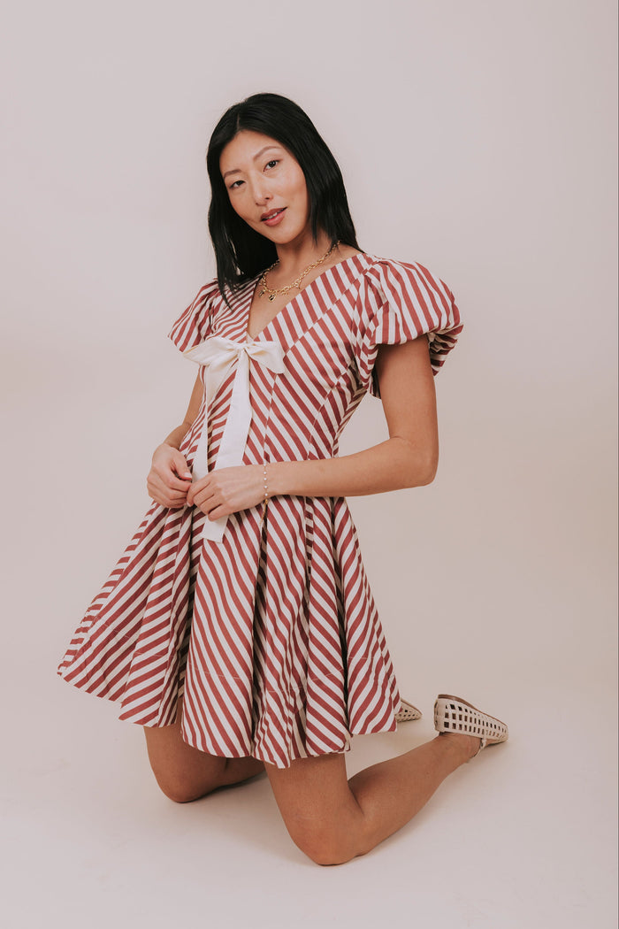 red and white stripe full skirt mini dress pose