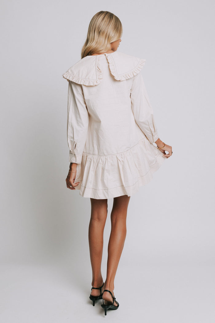 long sleeve ivory mini dress with ruffled trim collar back